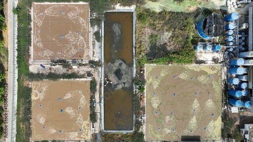 Drone captures a wastewater treatment site using aeration and sedimentation techniques to purify industrial effluent, emphasizing eco-conscious methods for pollutant reduction and water reclamation.
