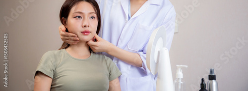 Young asian patient woman consulting with doctor in coat about wrinkle and skin for rejuvenate and beauty in modern medical office, doctor explaining and diagnostic facial of woman for cosmetology.