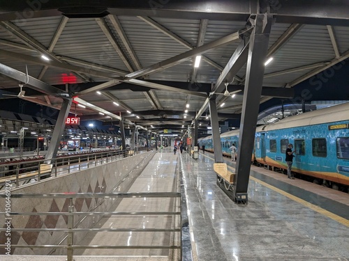 Photography Modern Indian Railway Platform with Passengers at Night