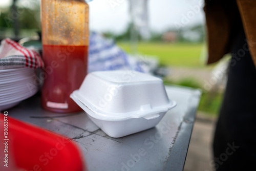 Fototapeta Naklejka Na Ścianę i Meble -  Package of food to serve customers. A small business on a truck