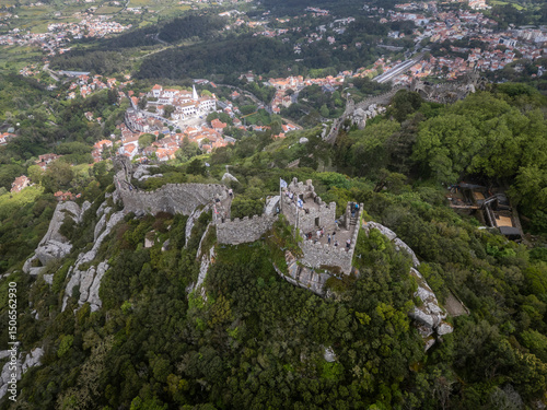 Beautiful aerial view to old historic Mooris Castle in green hill photo
