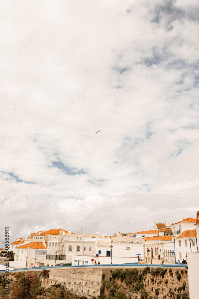 Obraz premium Walking cobbled streets in your European vacation Ericeira Portu