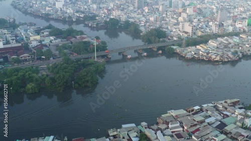 Ho Chi Minh City, Vietnam May 26,2025 4k aerial video of District 8 skyline, downtown of Ho Chi Minh City during sunrise