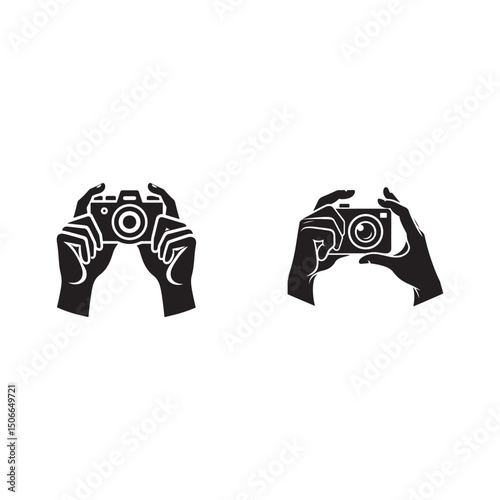 hands holding a camera