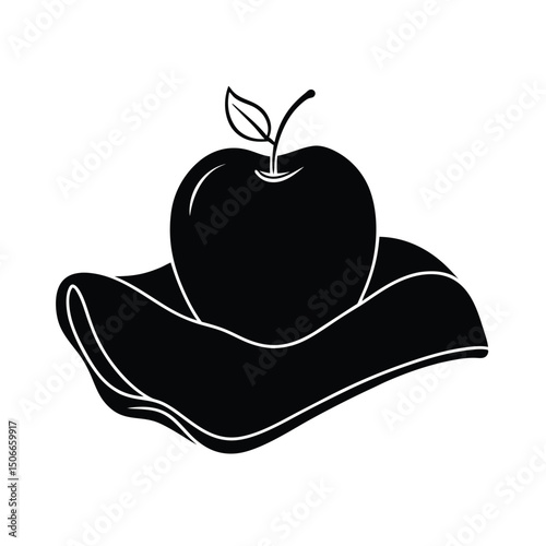 A Golden Apple Resting on Velvet Cloth
