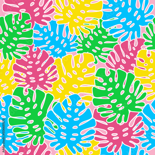 Seamless summer background with bright tropical leaves.