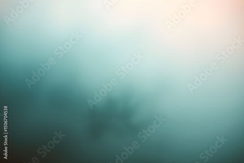 Blurred abstract image with soft gradients of teal and peach, creating a calm, ethereal atmosphere. Shapes suggest gentle movement or flow