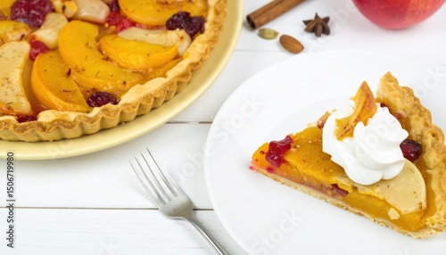Autumn fruit tart slice with whipped cream
