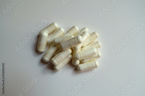 Group of white capsules of acetyl cysteine dietary supplement