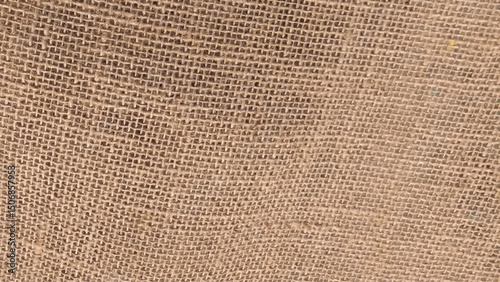 Close-up of fabric woven from burlap. Texture of jute canvas background 