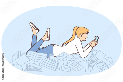Procrastination woman with phone lies on documents and stationery oblivious to mess