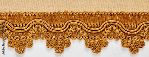 Bilde på lerret detail of silk trimmings for furniture, ochre color, classic style on white back
