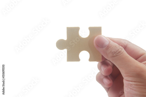 Puzzle piece placement creative workspace image minimalist background close-up problem solving concept