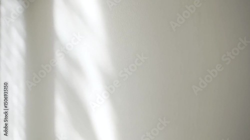 Shadows and light lines from curtain on the white wall background at sunny day. Transparent blurry shadow in morning sunlight with copy space for text,4K