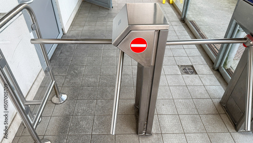 Rogue turnstile exudes metallic defiance during Empty Gates Festival, symbolizing urban transit's quiet rebellion and clandestine thresholds