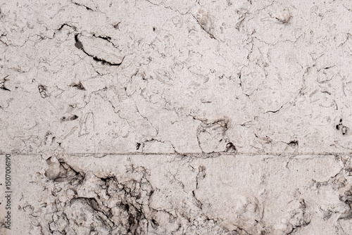 Worn and grungy stone tile in Lisbon, Portugal