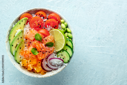 Poke bowl with salmon. Hawaiian salad with rice, fish, tomato, and avocado. Healthy diet. Shot from the top with a place for text