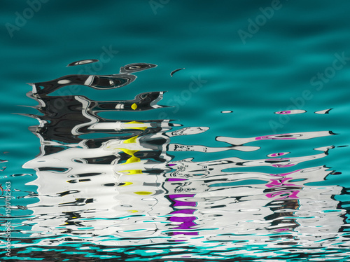 Blue water reflex background. Abstract reflection and abstract inspection elements in water. City, buildings, house elements distorted in the river. Rippled water texture. Disordered water surface