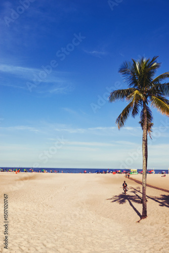 Fototapeta Naklejka Na Ścianę i Meble -  Rio de Janeiro, Brazil, May 19, 2025: Copacabana Beach is a beach located in the Copacabana neighborhood, in the South Zone of the city of Rio de Janeiro, Brazil. Beautiful blue skies and golden sand