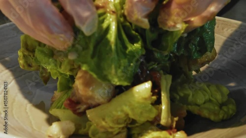 4K. Fresh salad with fresh lettuce leaves, boiled eggs in a bowl.