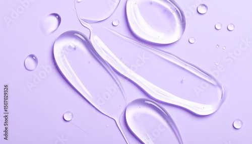 Transparent hyaluronic acid, gel or serum smear texture on purple backdrop. Moisturizing, skin care