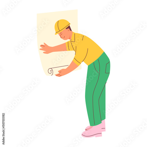 A male worker glues wallpaper. Repair concept