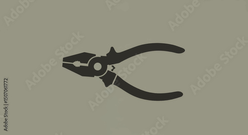 Pliers used for gripping and manipulating objects during a DIY project in a home workshop setting