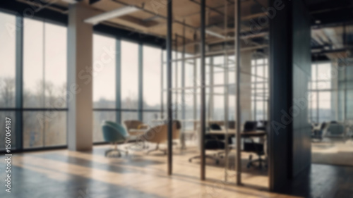 Beautiful blurred background of a light modern office interior with panoramic windows and beautiful lighting.