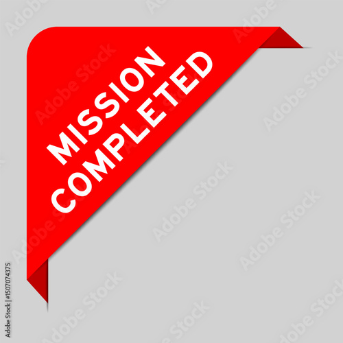 Red color of corner label banner with word mission completed on gray background