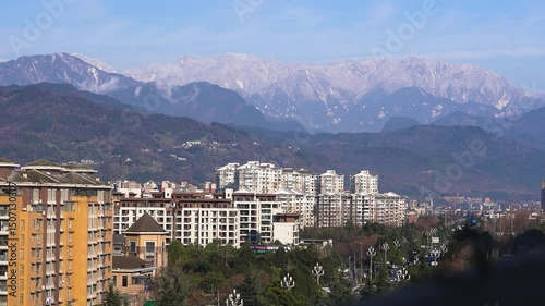 Winter season, Early of year. Snow mountains tower over the developing city of Chengdu, Sichuan, China