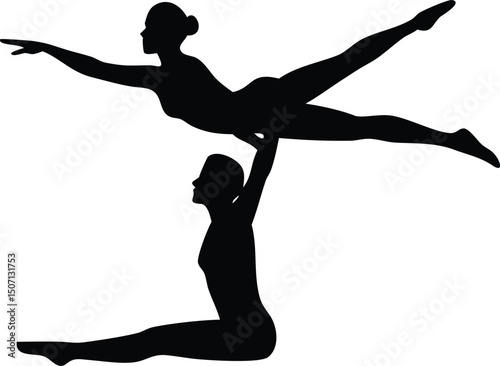 Silhouette of Two Female Acrobats Performing Balancing Act Together