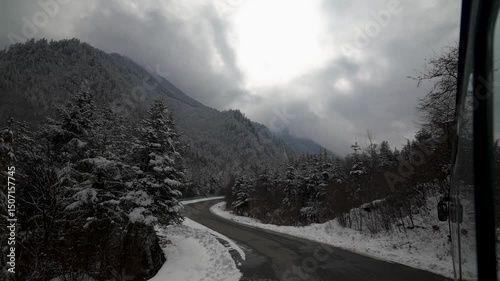 Bus Ride into the Heart of Bipenggou’s Winter Wilderness On January, Winter Stillness Along a Mountain Road. 