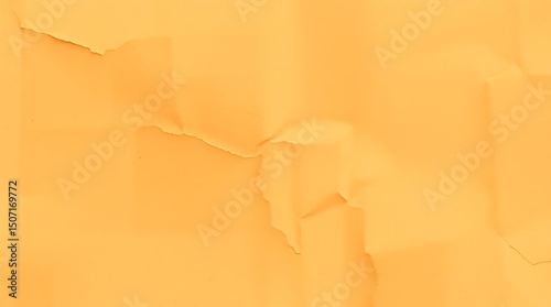 Abstract orange crumpled paper texture background