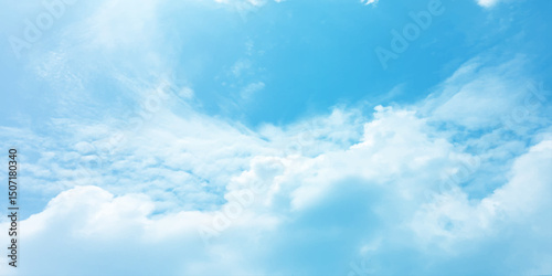 The blue sky and white clouds air indicate pure and fresh, bright weather canvas splashed with  store,m focusing on the clouds, a sunny day 