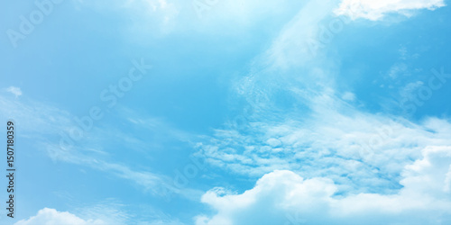 The blue sky and white clouds air indicate pure and fresh, bright weather canvas splashed with  store,m focusing on the clouds, a sunny day 