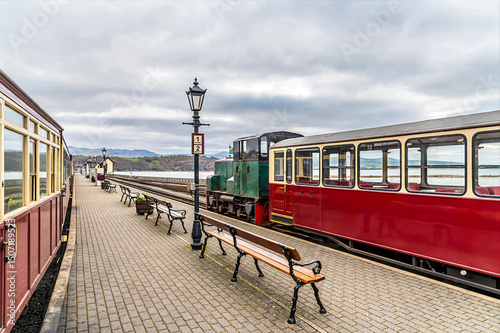 A view down the platform at the railway station at Porthmadog, Wales in springtime
