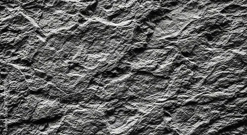 Black and white close-up of a rough rock wall texture, featuring a dark grunge background and empty space, Generative AI.