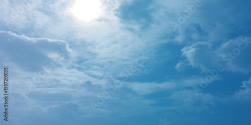 Blue sky with white bright beautiful clouds on a sunny day, picture image background photography, storm splashed soft focus, Spring fresh air nature