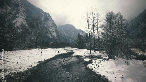 Snowy mountain view and clear stream, The winter ecosystem of the Bipenggou national park