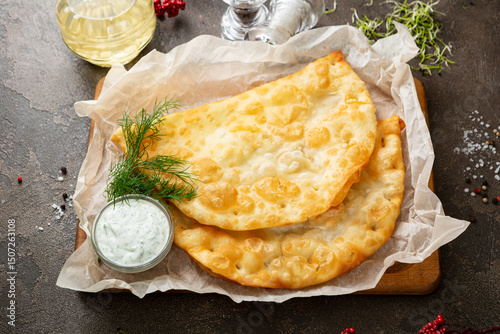 Cheese and meat homemade pastry cheburek top view