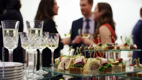 Elegant Event Catering Close Up with Champagne and Appetizers in Soft Focus