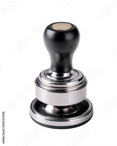 A metal espresso tamper with a black wooden handle sits upright on a plain white surface ready for making freshly pressed coffee in a modern kitchen setting. photo