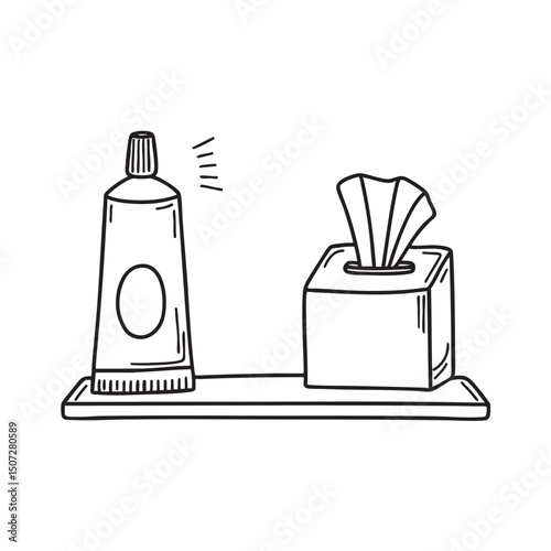 A toothpaste resting beside a tissue box on the shelf