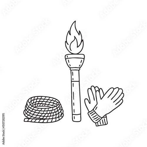 A torch lying beside a coiled rope and gloves