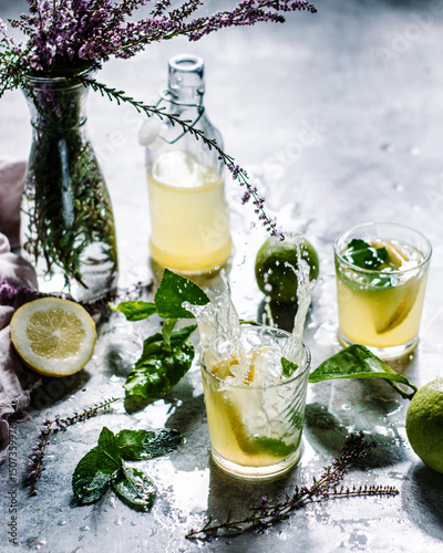 Refreshing lemonade with mint leaves and lemon slices