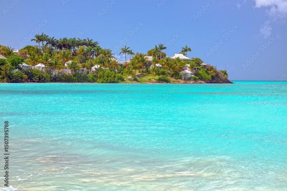 Fototapeta premium Luxury tropical villas on island coast with turquoise sea