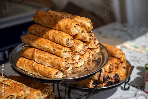 Obraz na płótnie Traditional Moldovan and Romanian baked pies called Varzare or Placinte with cottage cheese filling, homemade pastries w salonie