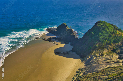 Aerial view of Cape Reinga, the northernmost point of North Island, New Zealand. The Cape is of great spiritual significance to the Maori population
