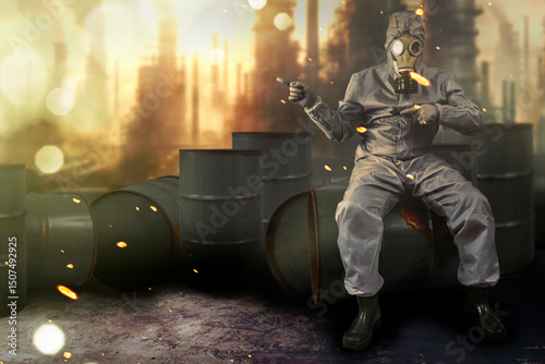 A man in a gas mask and protective suit sitting on a barrel of chemical waste and pointing to the side. Environmental pollution concept. Dirty air with dust and noise, grunge effect.