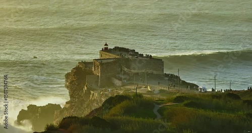 Aerial view of ocean coast with iconic lighthouse on the edge. Beautiful nature of Atlantic in Portugal